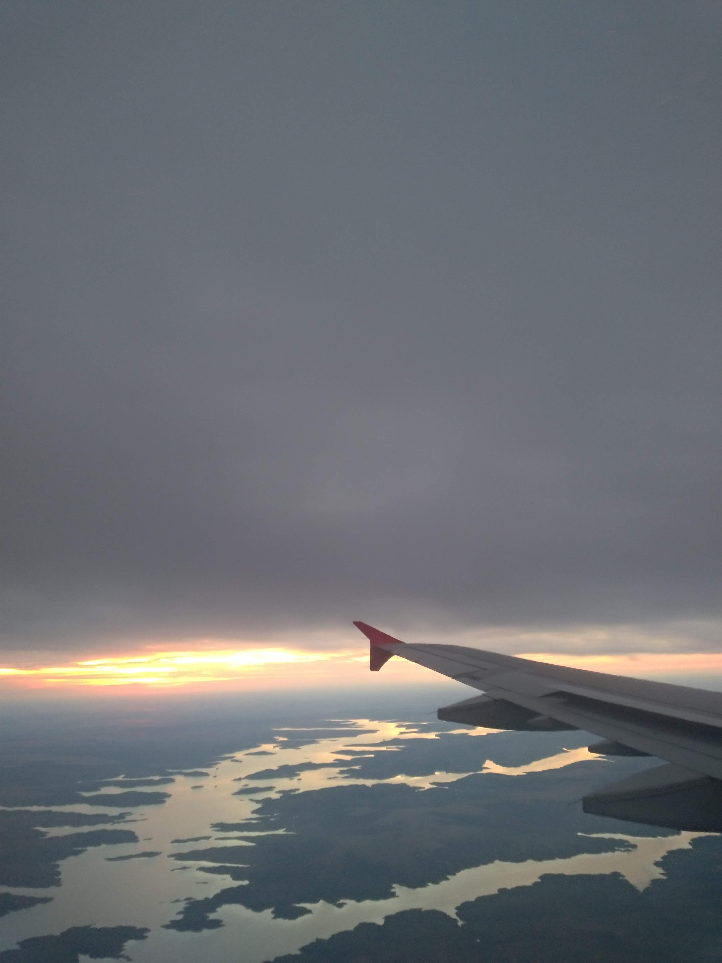 An airplane wing above water
