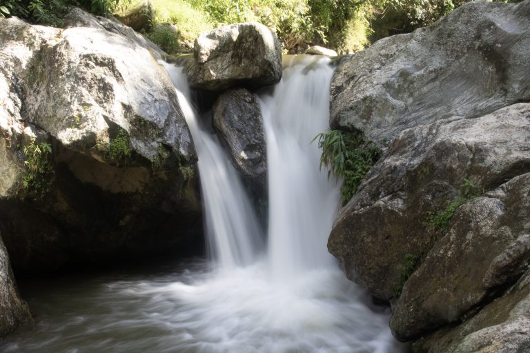 WaterFall Kathmandu. Water falling over large rocks, only a meter or two tall.