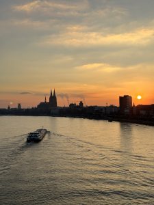 View over the Rhine at Cologne Cathedral during sunset