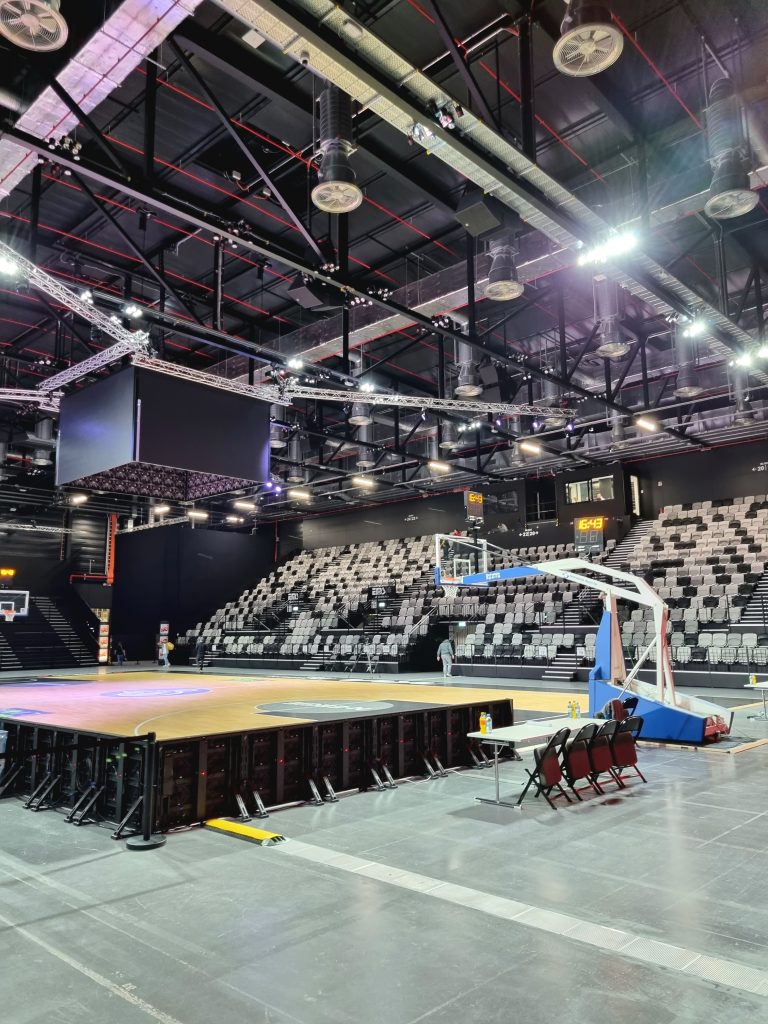 The interior of an empty basketball arena before the game.