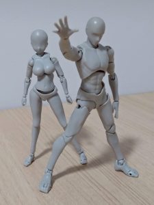 A toy figurines of a man and a woman