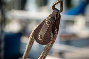 Close-up of pulley on a classic sail boat.
