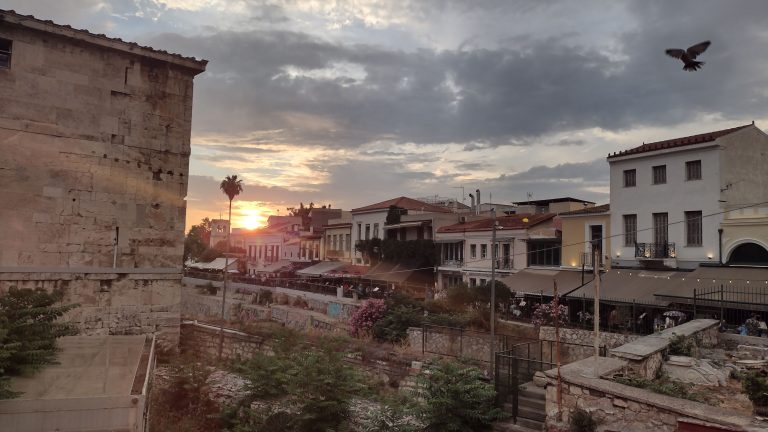 A view to Adrianoy Street, near Ancient Agora of Athens in sunset, after a rainy afternoon.