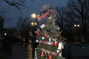 US flag and a Christmas tree
