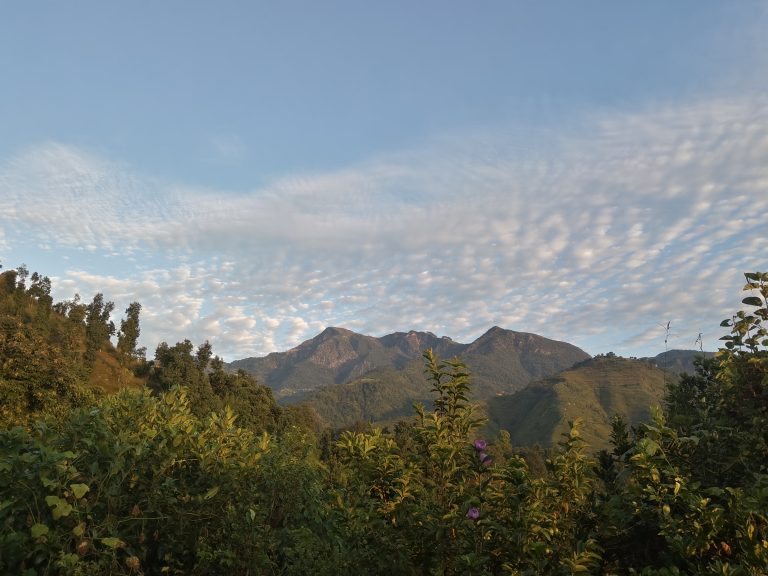 Cloudy Blue Sky and Hills