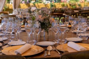 A wedding banquet table, perfectly prepared to receive the guests.
