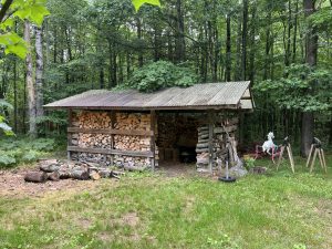 Woodshed, hold enough wood to heat a home in northern Michigan for a winter.