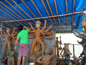 Man creating Hindu idols.

