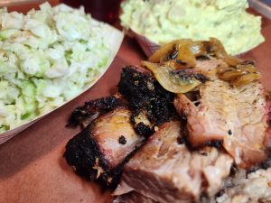 Beef brisket with coleslaw and potato salad