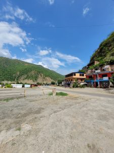 B.P. Highway in Nepal, Few Houses, Green Hills and Clear Sky