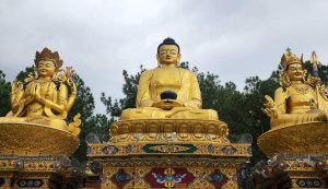 A golden statue of Gautam Buddha in Swayambhunath Kathmandu Nepal
