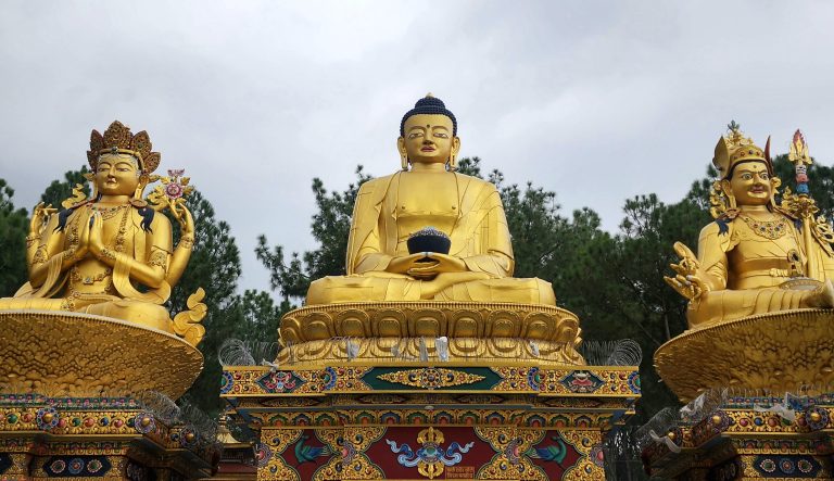 A golden statue of Gautam Buddha in Swayambhunath Kathmandu Nepal