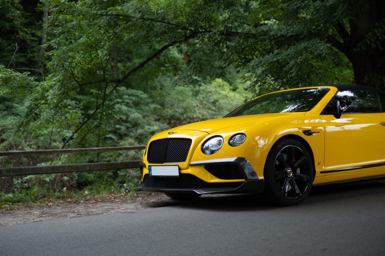 Yellow Bentley Continental GTC.