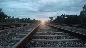 Image of a railway tracks with amazing sky in the background at Chilahati Station.
