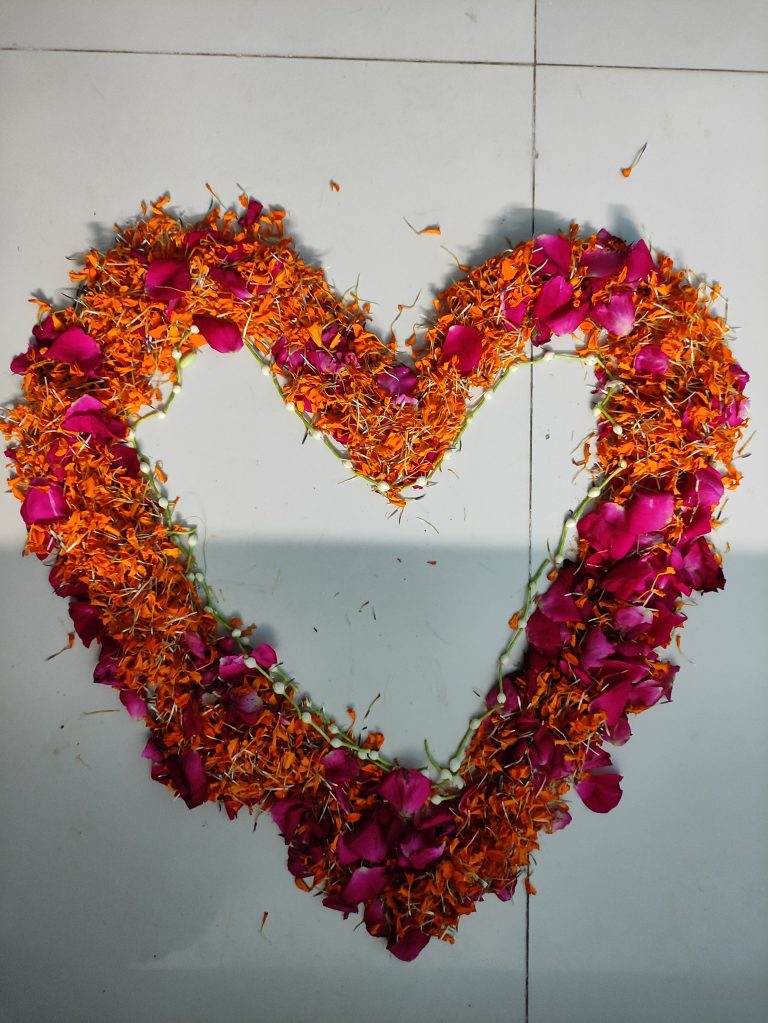 A heart made out of flowers, a tradition to welcome the newlyweds to their bedroom in Bangladesh