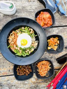 Bibimbap, Korean spicy salad with rice and fried egg – traditionally Korean food style.
