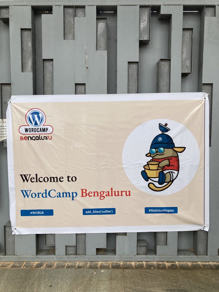 WordCamp Bengaluru 2023 venue main gate banner.