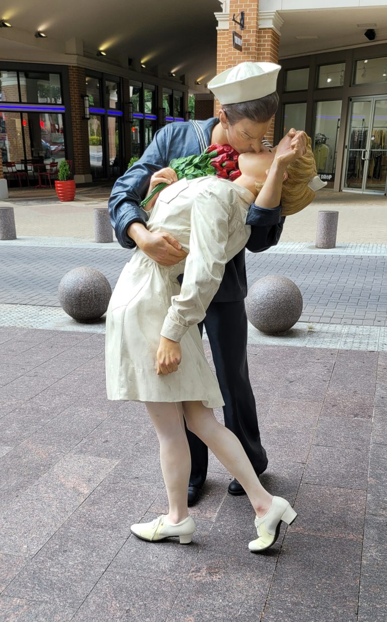 Statue of a navy man kissing his bride at the National Harbor in Maryland.