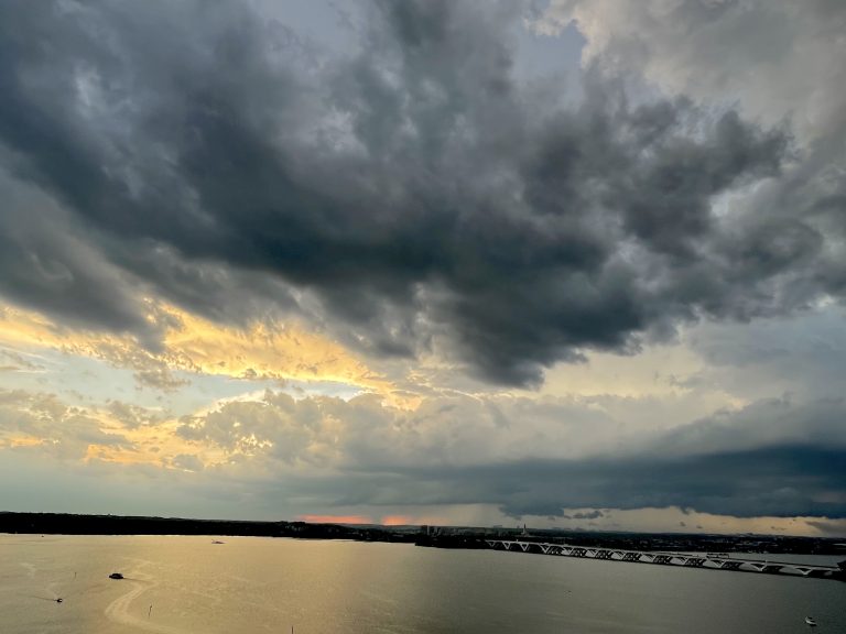 The rain is coming. A cloudy evening. Long view of Woodrow Wilson Memorial Bridge from Gaylord convention centre, National Harbor, Maryland