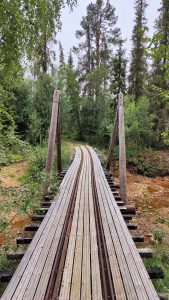Wooden narrow track train bridge.
