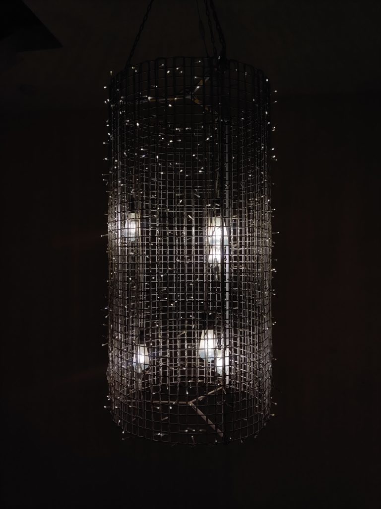 a vertical electric lamp