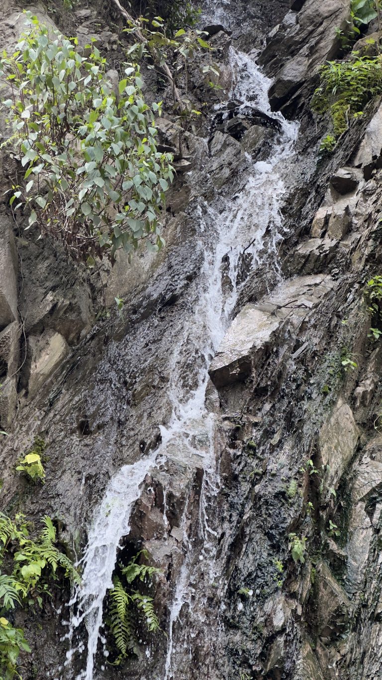 A small waterfall in a stone