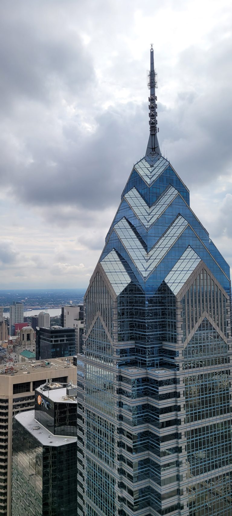 Liberty Place out the window of the Pyramid Club across the way on the 52 floor. Cloudy day and view of the city of Philadelphia.