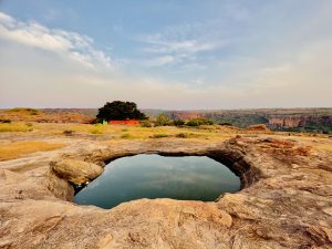 The small pond and evening view from the top of the Badami hills. Bagalkot district, Karnataka