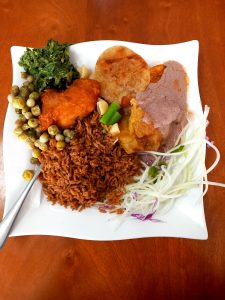 Ugandan food, matooke rice gnuts and chicken 