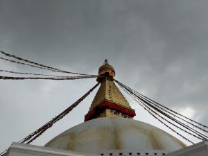 Boudhanath Stupa and black clouds about to rain in Kathmandu, Nepal