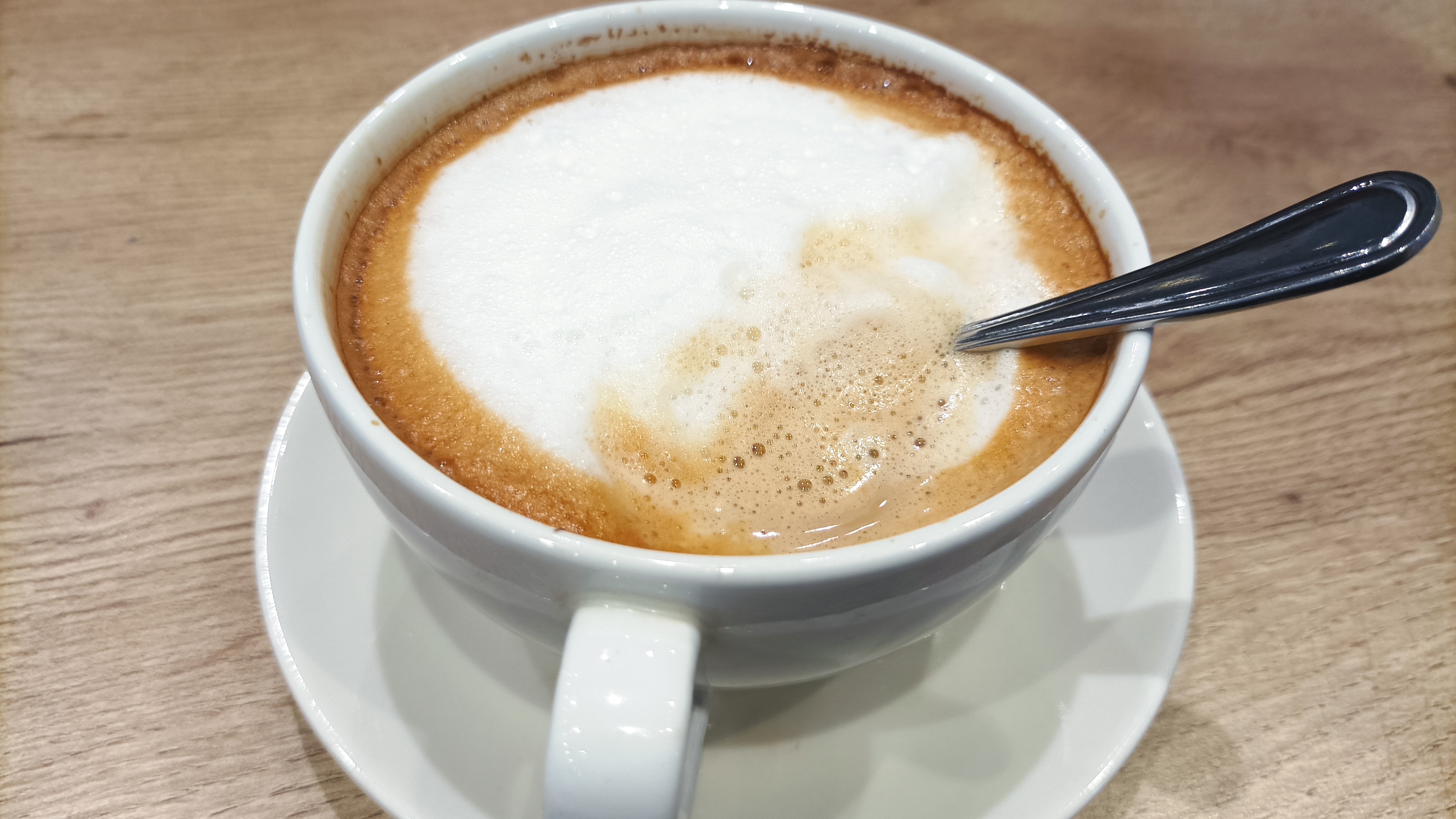 Cappuccino based drink with steamed milk and extra foam.