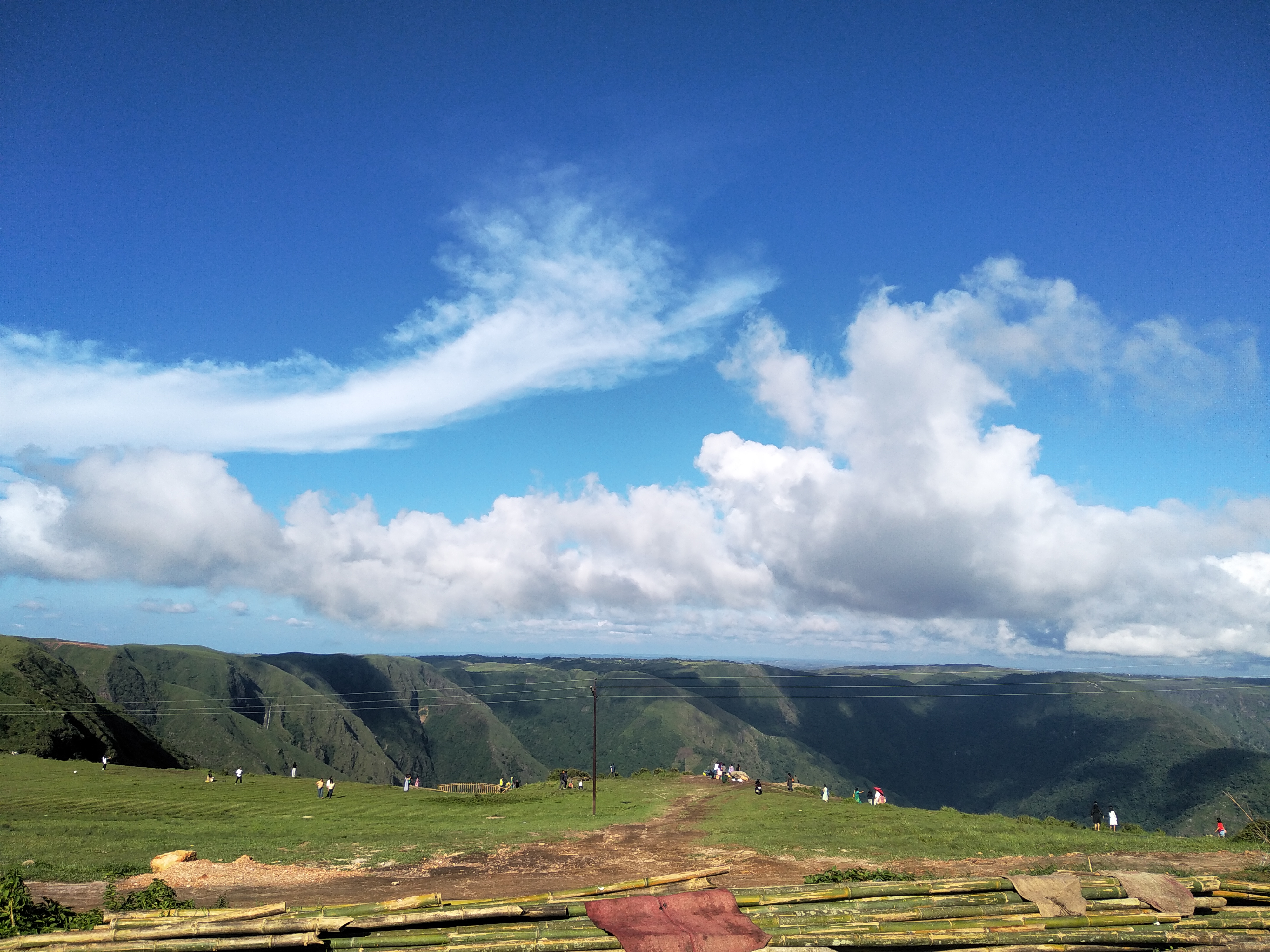 Nature amazes at every turn. Beautiful landscape with green fields and blue sky.