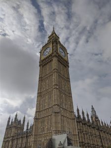 The Elizabeth Tower (commonly referred to as “The Big Ben”) in London, photographed from its northwestern angle in front of a cloudy sky.
