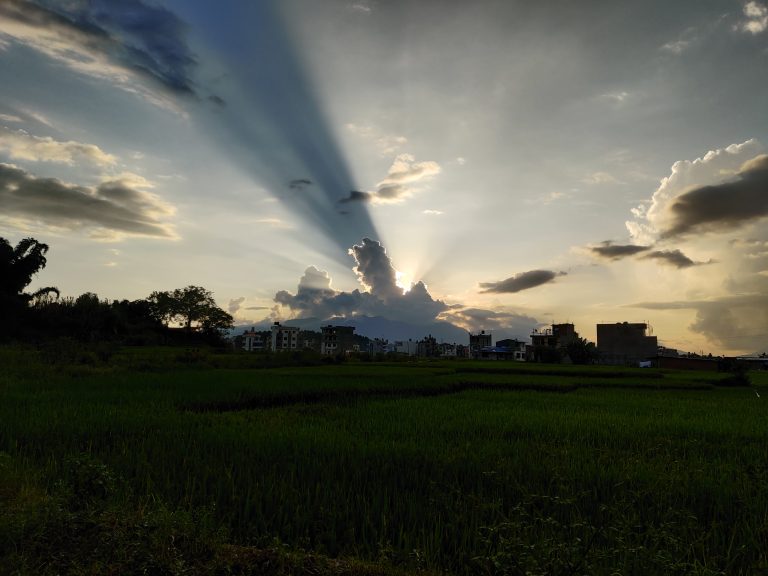 Clouds hiding the sun and create the beautiful rays