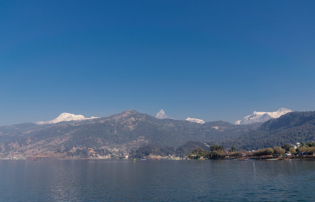 Phewa Lake and Mountains on the background. Nepal.