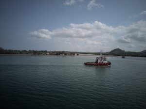 small ship near the harbor