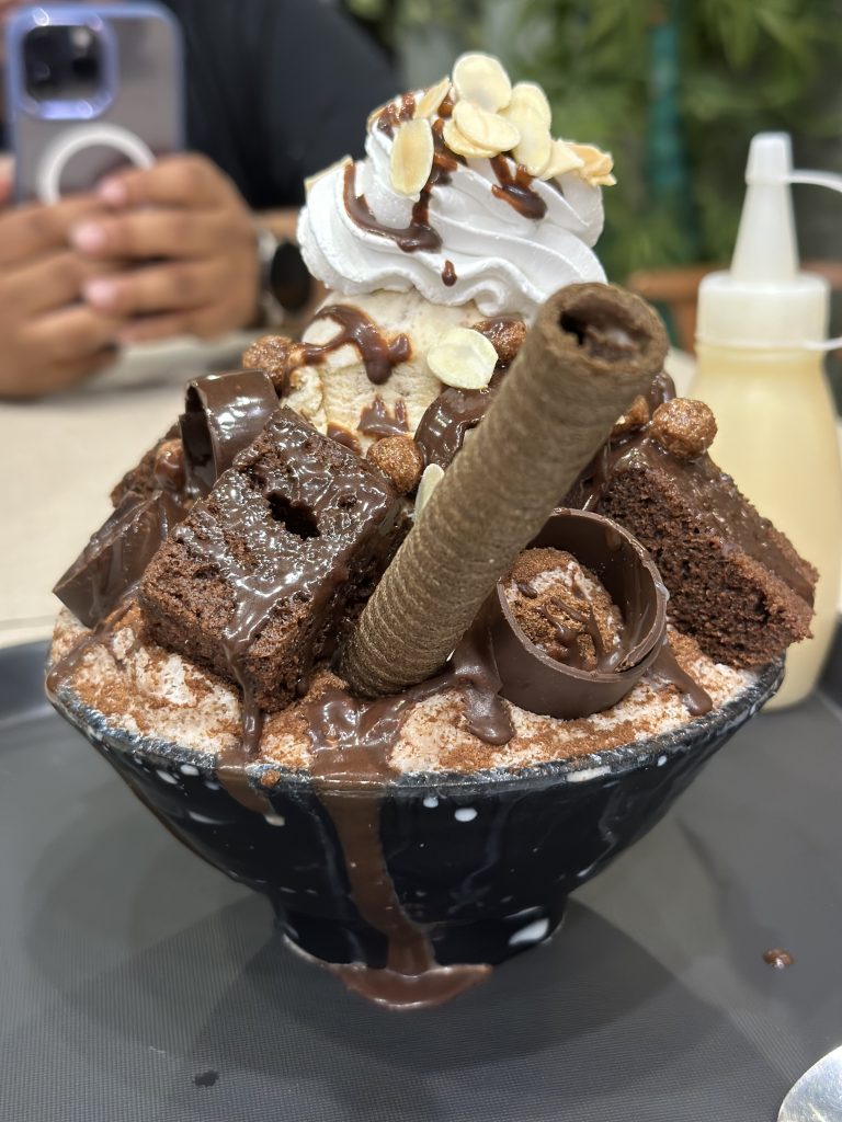 A bowl of ice cream with chocolates in it. This is from a popular cake parlor in Pattaya, Thailand.