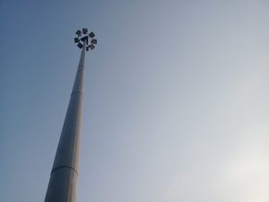 A cluster of lights on a lighting pole at the front of the Masjid Agung Demak, also known as the Demak Great Mosque. The building is also known as the Demak Great Mosque, located in Central Java.
