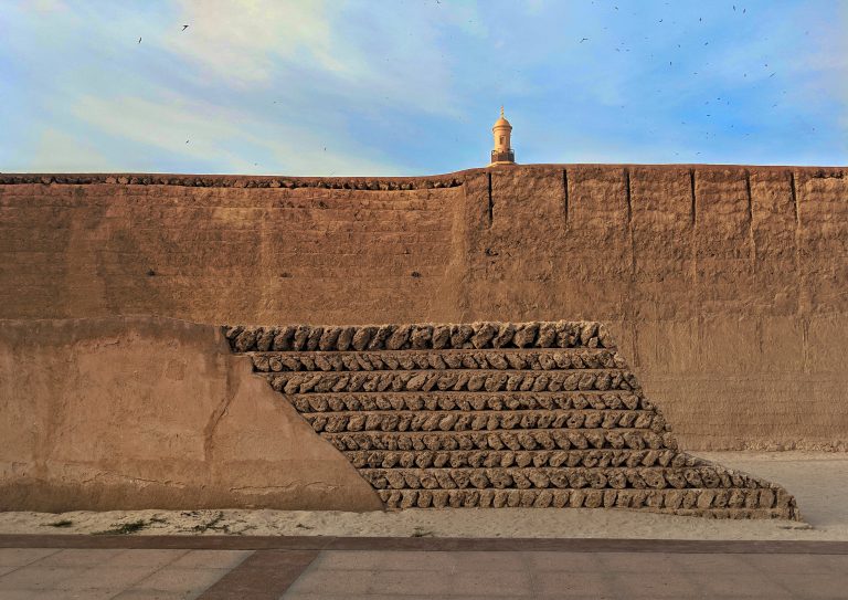 View of an old mud and brick wall in Dubai.