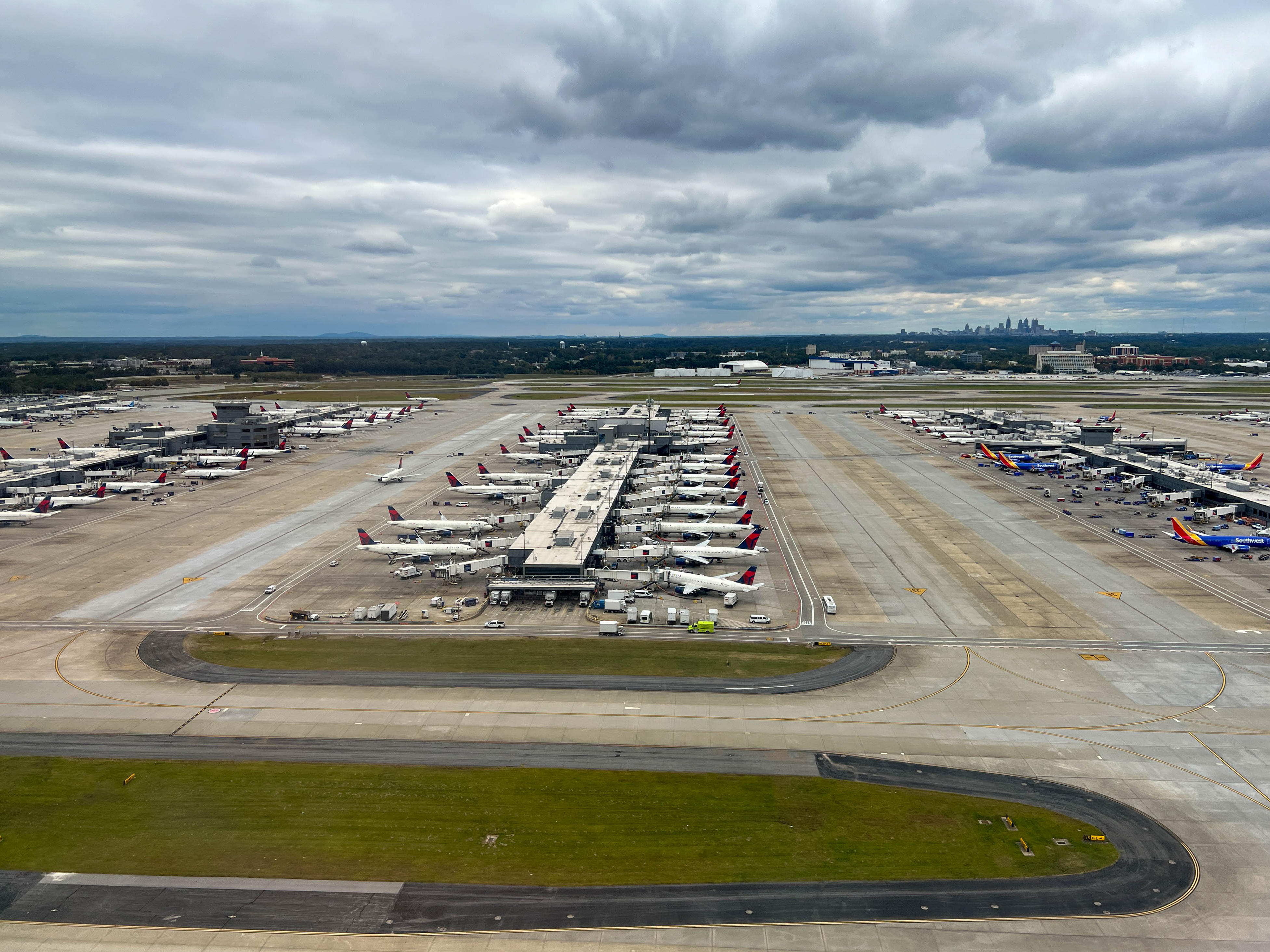 Planes at gates as seen from above.