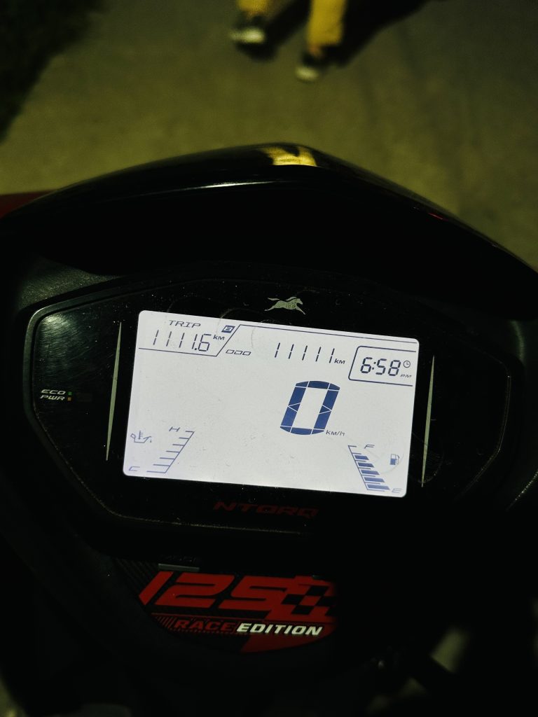 Travel meter of a scooter with 11111 KM in it.