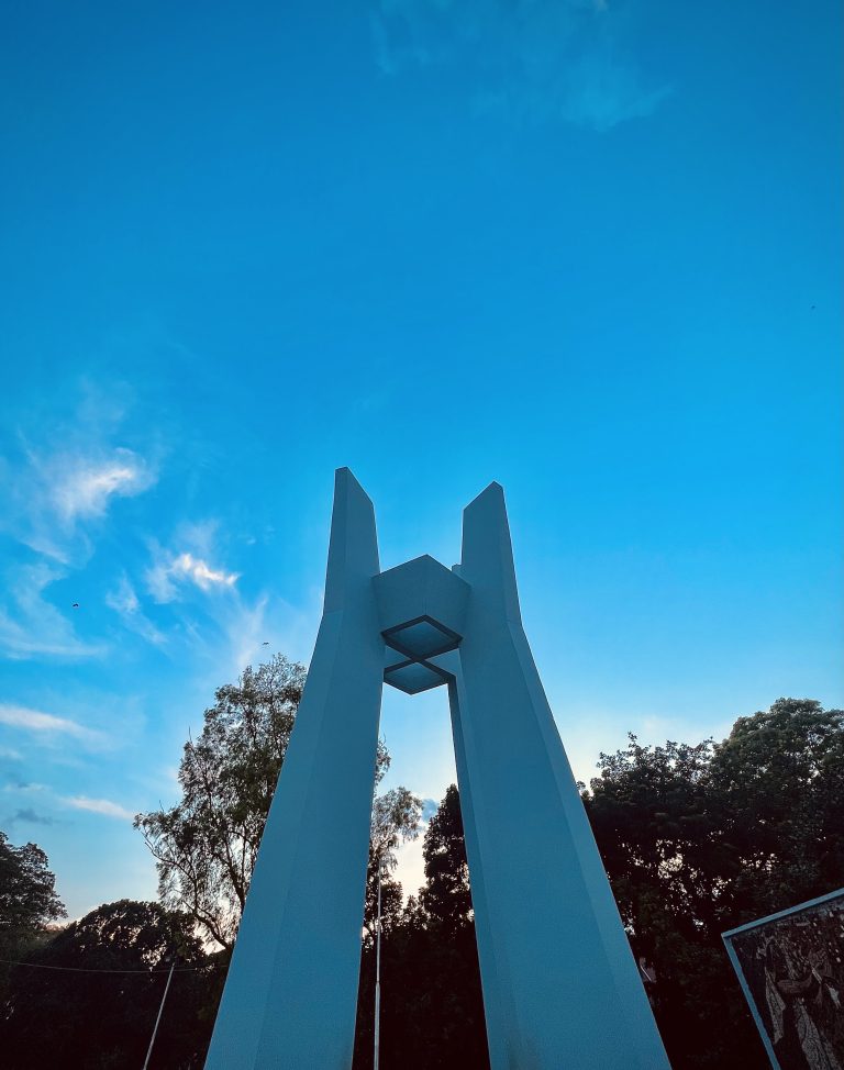 Abstract scupture outdoors against a blue sky