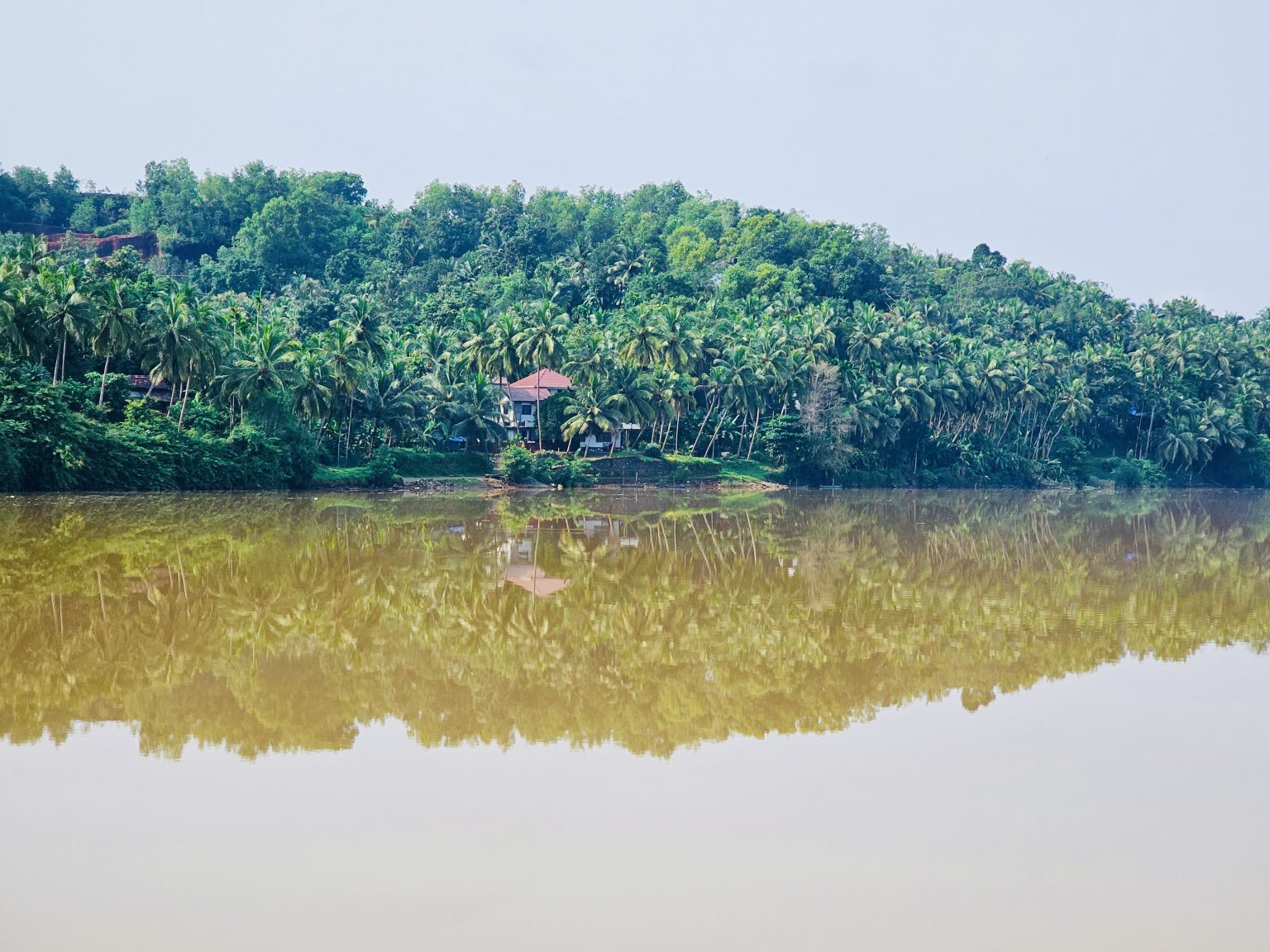 Shadows in the mud water of Chaliyar river after heavy rains. From Perumanna, Kozhikode, Kerala.