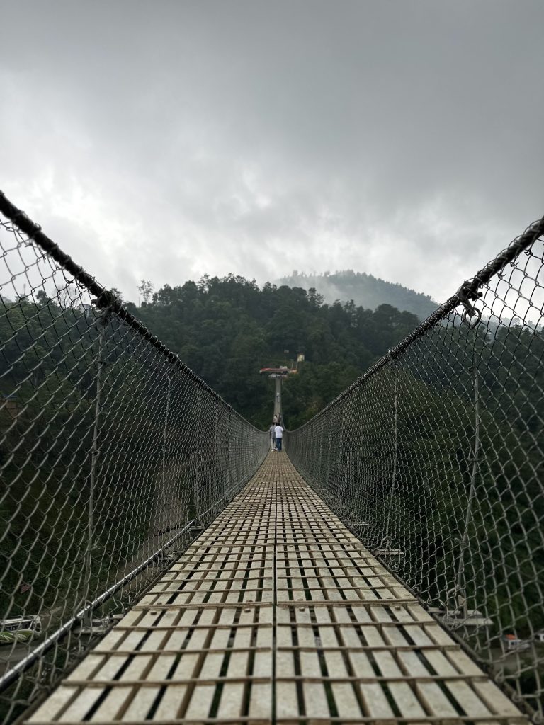 A long suspension bridge in Kathmandu Nepal. It connects two part of the village.