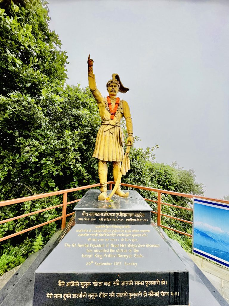 Statue of King Prithvi Narayan Shah on a foggy & rainy day. The founder of Kingdom of Nepal and great figure in Nepal history. From Bagmati, Kathmandu, Nepal.