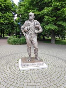 Monument to Feliks Stamm, boxer and coach of the Polish national team, standing figure.

