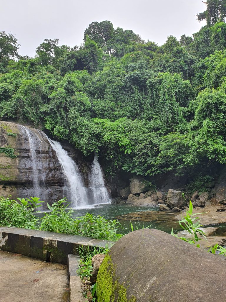 Beautiful falls on the green high hill