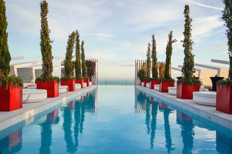 Infinity pool at a hotel rooftop.