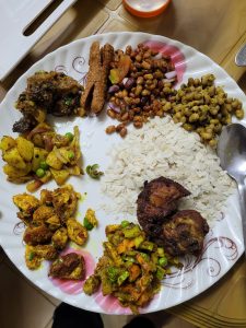 Home made Nepali khaja set with flattened rice, beans, chichken roast, sussage, potato sadheko, etc
