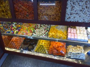 Candy, sweets, and pastries on shop shelves